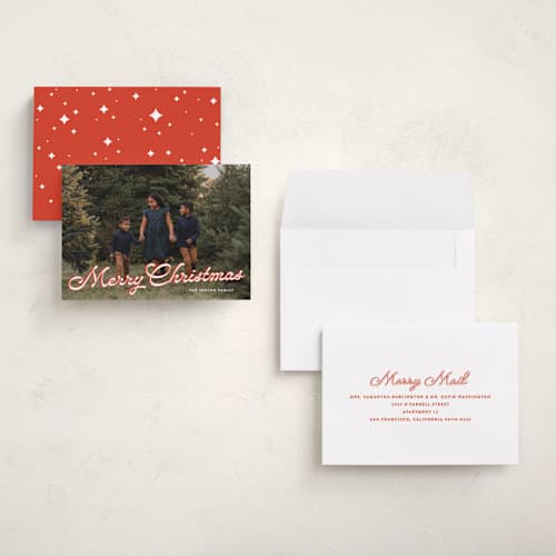 This is a poinsettia holiday photo cards with standard by Ekko Studio called retro script printing on signature in grand