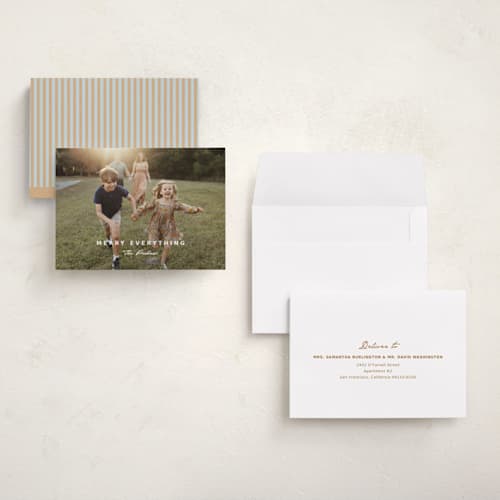 This is a snow holiday photo cards with standard by Yaling Hou Suzuki called the pursuit of merry printing on signature in grand