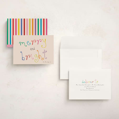 This is a blush holiday photo cards with standard by Morgan Kendall called playful letters printing on signature in grand