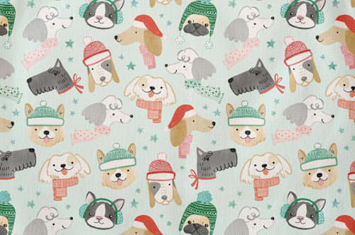 This is a mint aprons by Monika Torun called christmas puppies in standard