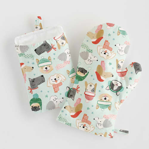 This is a mint aprons by Monika Torun called christmas puppies in standard