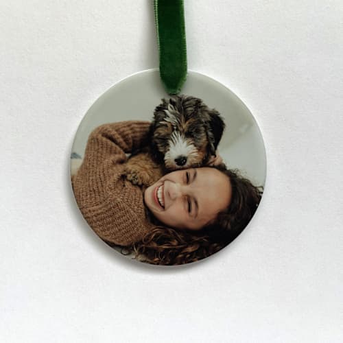 This is a multicolorassorted-colors holiday decorations by Holly Whitcomb called personalized photo memory ornament in standard