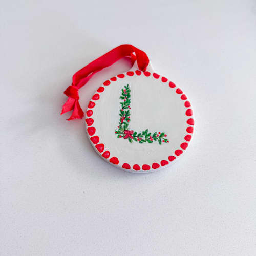 This is a white holiday decorations by Arohika Verma called custom initial ornament in standard