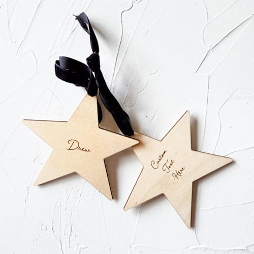 This is a beige holiday decorations by Left Grain called personalized star wooden ornament in standard