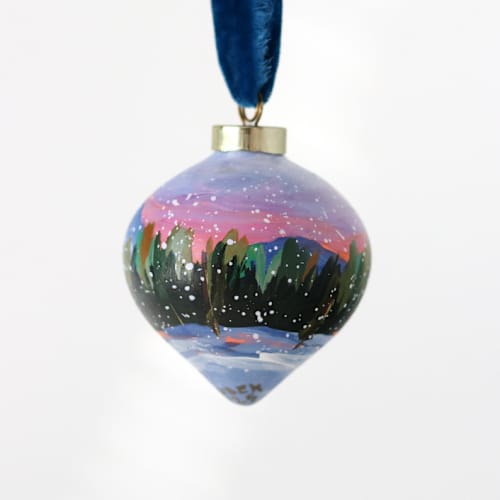 This is a multicolor holiday decorations by Weronika Zubek called snowy pine sunset ornament - 13 in standard