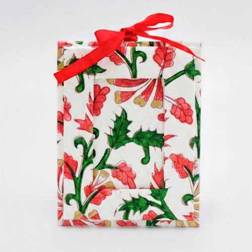 This is a red holiday decorations by Inner Child called mini blockprint picture frame ornament | jungle bloom in standard