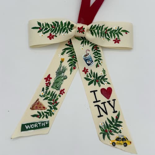 This is a beige holiday decorations by Ashley Myers called custom location hand-painted bow ornament in standard