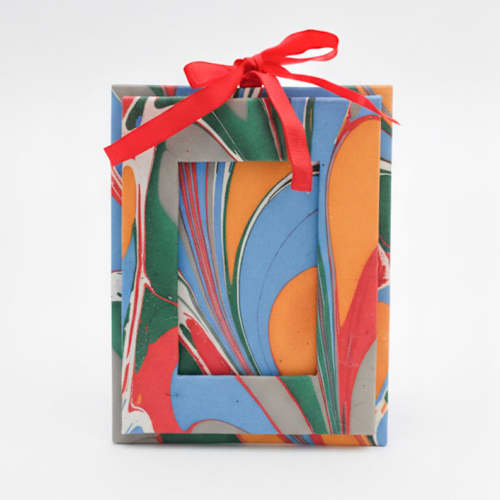 This is a multicolor holiday decorations by Inner Child called mini hand-marbled picture frame ornament | marais in standard