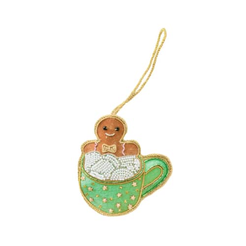 This is a brown holiday decorations by Jollity and Co called gingerbread man in a mint mug embellished christmas ornament in standard