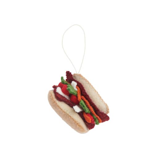 This is a white holiday decorations by Global Goods Partners called felt sandwich ornament-banh mi in standard