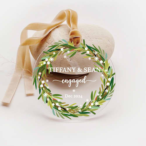 This is a green holiday decorations by Iveta Abolina called personalized acrylic green wreath engagement ornament, set of 1 in standard