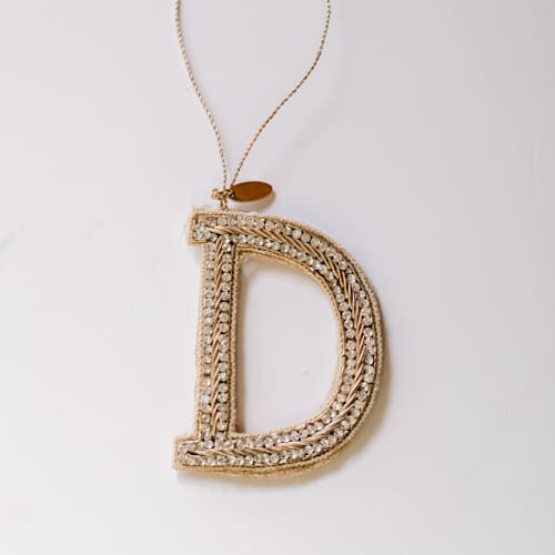 This is a silver holiday decorations by Courtney Bedi called personalized handmade letter ornament - large d in standard