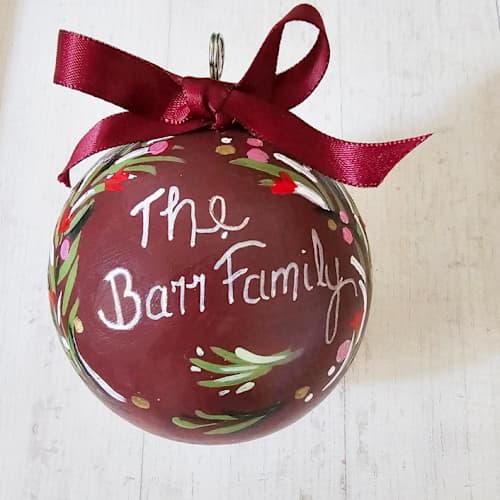 This is a multicolor holiday decorations by AlisonJerry called custom family name or person, burgundy, red or green ornament in standard