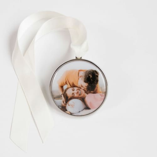 This is a silver holiday decorations by Kimbra Designs called 2026 custom photo ornament silver round in standard