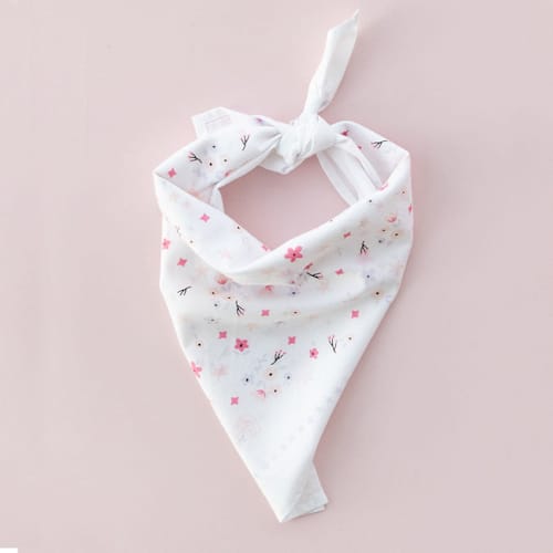 This is a white party favors by Jollity and Co called pony tales "ditsy floral" bandana in standard