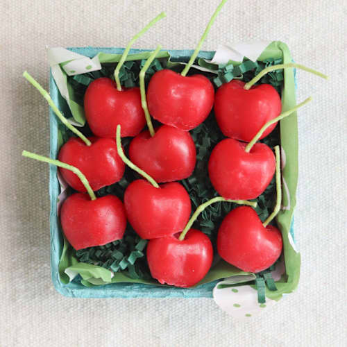 This is a multicolorassorted-colors party decorations by Happy Organics called cherry birthday beeswax candles in standard