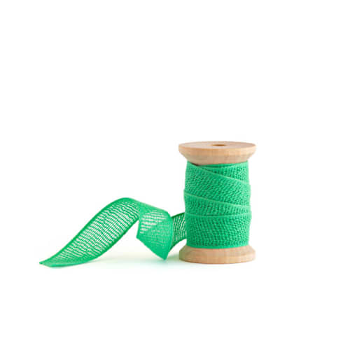 This is a teal wedding ribbon by Minted called teal loose weave cotton in standard