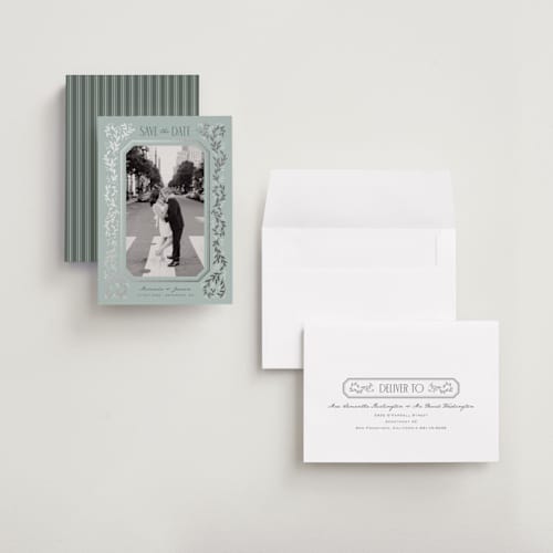 This is a seafoam foil stamped save the date cards with foil pressed by Laura Hankins called ornate vines printing on recycled smooth signature in grand