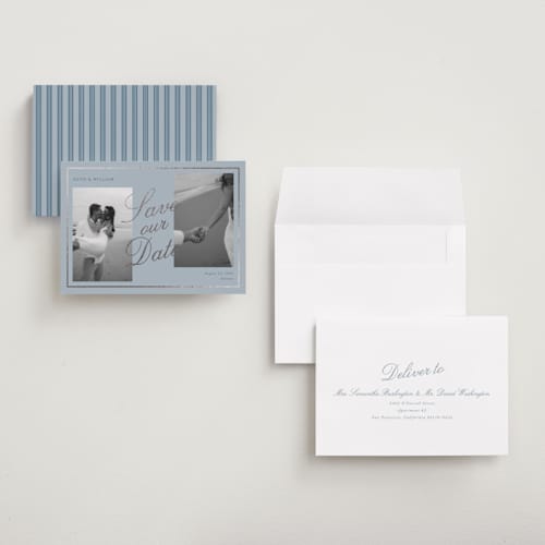 This is a french blue foil stamped save the date cards with foil pressed by Brianne Larsen called timeless love printing on recycled smooth signature in grand