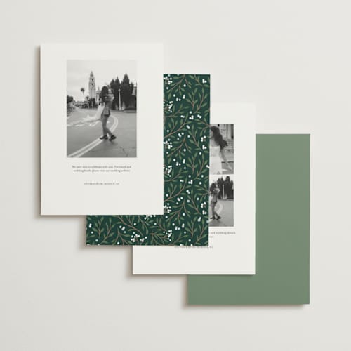 This is a evergreen foil stamped save the date cards with foil pressed by Alethea and Ruth called illuminated storybook printing on signature in standard