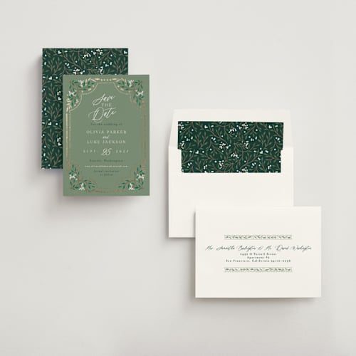 This is a evergreen foil stamped save the date cards with foil pressed by Alethea and Ruth called illuminated storybook printing on signature in standard