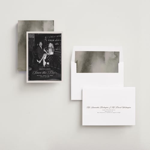 This is a antique foil stamped save the date cards with foil pressed by Nicole Walsh called tux printing on recycled smooth signature in standard