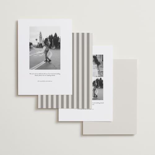 This is a ivory foil stamped save the date cards with foil pressed by Emily Betts called story printing on recycled smooth signature in standard