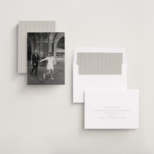 This is a cotton foil stamped save the date cards with foil pressed by Amy Kross called veneer printing on recycled smooth signature in standard