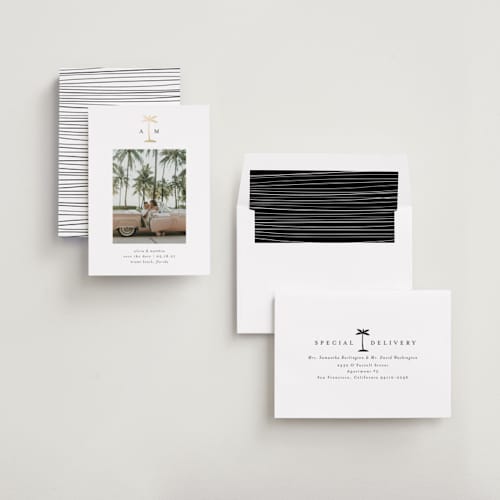 This is a coconut foil stamped save the date cards with foil pressed by Heather Schertzer called palm tree printing on recycled smooth signature in standard