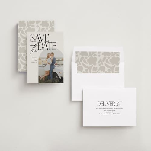 This is a ecru foil stamped save the date cards with foil pressed by Morgan Kendall called penelope printing on recycled smooth signature in standard