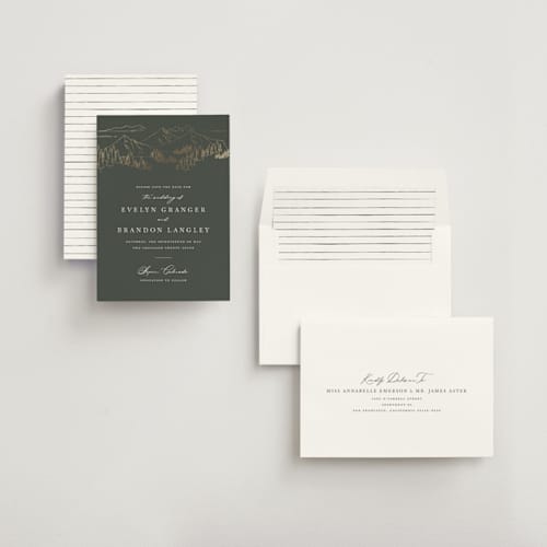 This is a hunter foil stamped save the date cards with foil pressed by Sarah Brown called peaks printing on signature in standard