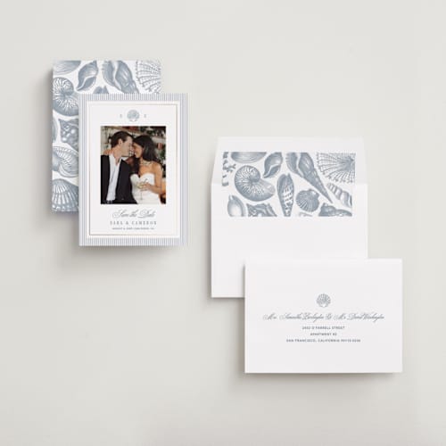 This is a coast foil stamped save the date cards with foil pressed by Kelly Schmidt called seashore printing on recycled smooth signature in standard