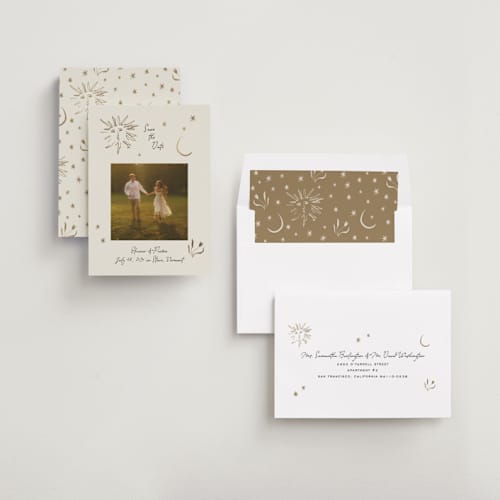 This is a champagne foil stamped save the date cards with foil pressed by Heather Schertzer called soleil printing on recycled smooth signature in standard