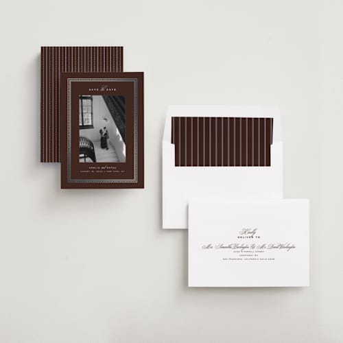 This is a espresso foil stamped save the date cards with foil pressed by Ana de Sousa called the metropolitan printing on recycled smooth signature in standard