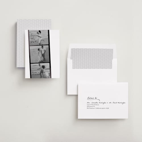 This is a onyx foil stamped save the date cards with foil pressed by Sarah Mraz called filmstrip printing on recycled smooth signature in standard