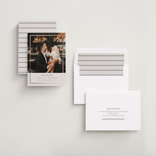 This is a linen foil stamped save the date cards with foil pressed by Nicole Walsh called shimmer printing on recycled smooth signature in standard