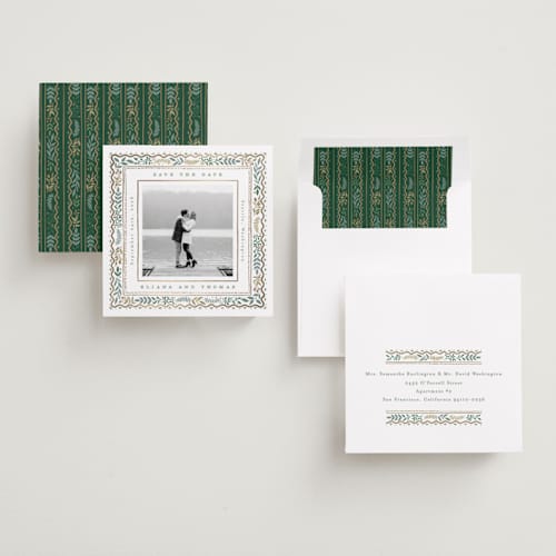 This is a snow foil stamped save the date cards with foil pressed by Alethea and Ruth called square leafy border printing on recycled smooth signature in square