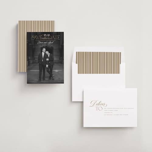 This is a pearl foil stamped save the date cards with foil pressed by Leah Bisch called union printing on recycled smooth signature in standard