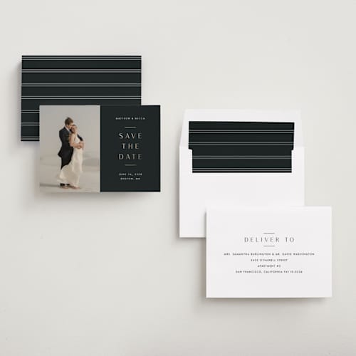 This is a charcoal foil stamped save the date cards with foil pressed by Stacey Meacham called subtle elegance printing on recycled smooth signature in standard