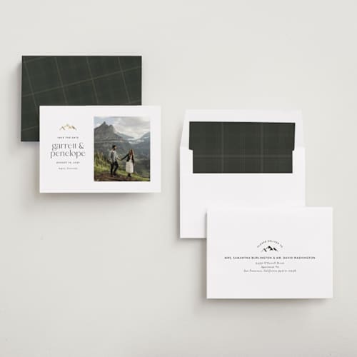 This is a snow foil stamped save the date cards with foil pressed by Amy Payne called minimal mountain printing on recycled smooth signature in standard