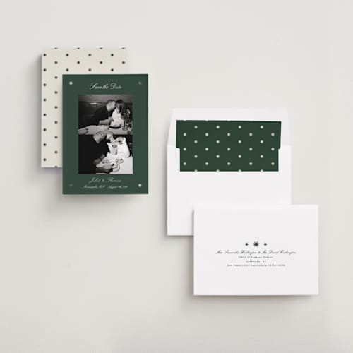 This is a pine foil stamped save the date cards with foil pressed by Kelly Watkins called stars printing on recycled smooth signature in standard