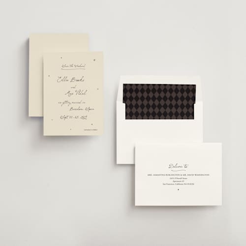 This is a noir foil stamped save the date cards with foil pressed by Ani Somi called written in the stars printing on signature in standard