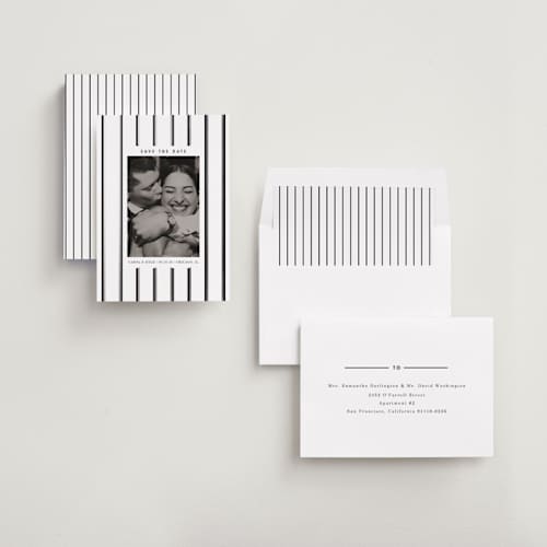 This is a snow foil stamped save the date cards with foil pressed by Baumbirdy called stripes printing on recycled smooth signature in standard