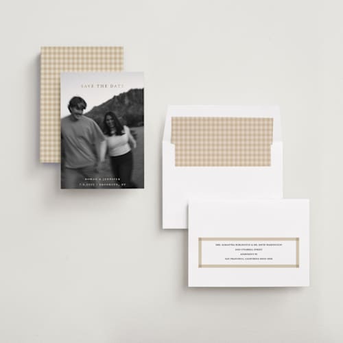 This is a buttercream foil stamped save the date cards with foil pressed by Carolyn Hunt called golden printing on recycled smooth signature in standard