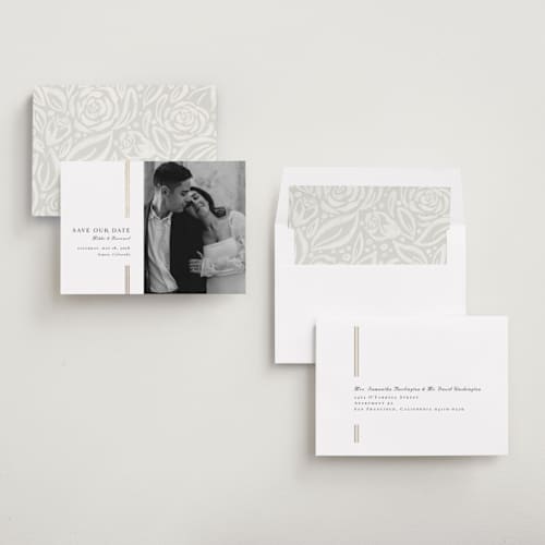 This is a lily foil stamped save the date cards with foil pressed by Orasie called bookmark a new page printing on recycled smooth signature in standard