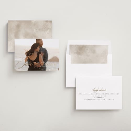 This is a quartz foil stamped save the date cards with foil pressed by Design Lotus called sway printing on recycled smooth signature in standard