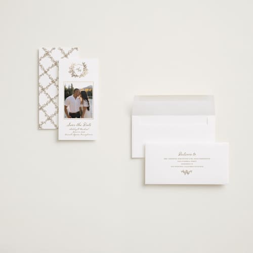 This is a ivory foil stamped save the date cards with foil pressed by Cass Loh called boho flower crest printing on recycled smooth signature in tall
