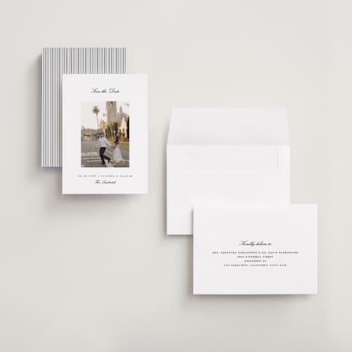 This is a snow petite save the dates with standard by Pixel and Hank called minimal printing on recycled smooth signature in petite