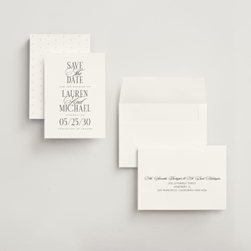 This is a obsidian petite save the dates with standard by Jennifer Postorino called stacked type printing on signature in petite