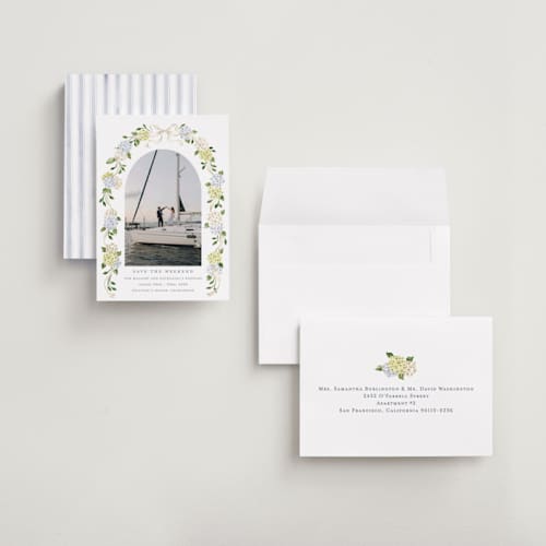 This is a coastline petite save the dates with standard by Sarah Knight called coastal hydrangea printing on recycled smooth signature in petite